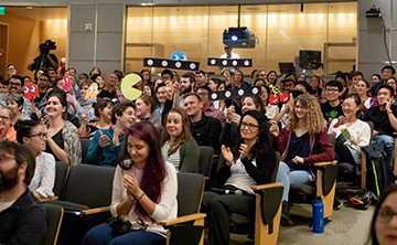 Audience for 2019 postdoc slam cheers finalists on