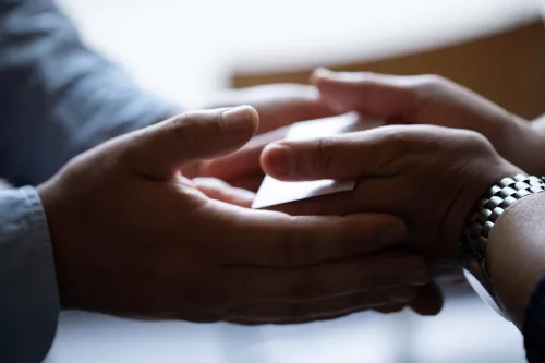 Chaplain Joe Frias, left, blessed the hands of Rosa Rist, LVN in Executive Health, in appreciation for the hard work she does providing care for patients, the Hand Blessing event was part of the UCSF Health Appreciation Week, at the ground floor Meditation Room at the Mission Bay Hospital.