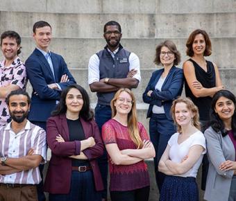 Ten Postdoc Slam finalists pose for a group photo