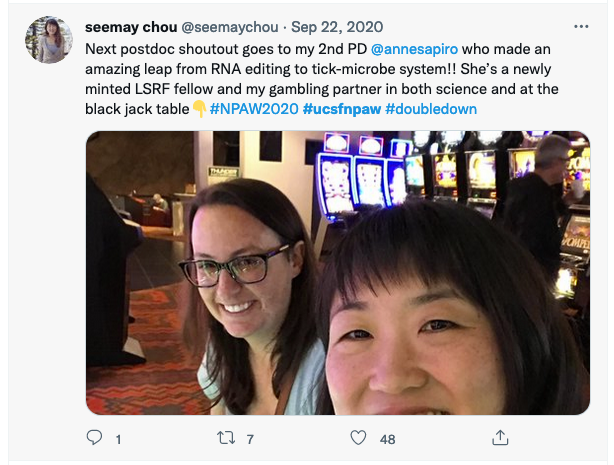 Tweet from seemay chou at seemaychou Next postdoc shoutout goes to my 2nd postdoc ⁦ anne sapiro⁩ who made an amazing leap from RNA editing to tick-microbe system!! She’s a newly minted LSRF fellow and my gambling partner in both science and at the black jack table #NPAW2020 #ucsfnpaw #doubledown Photo of two poeple smiling with slot machines in the background.